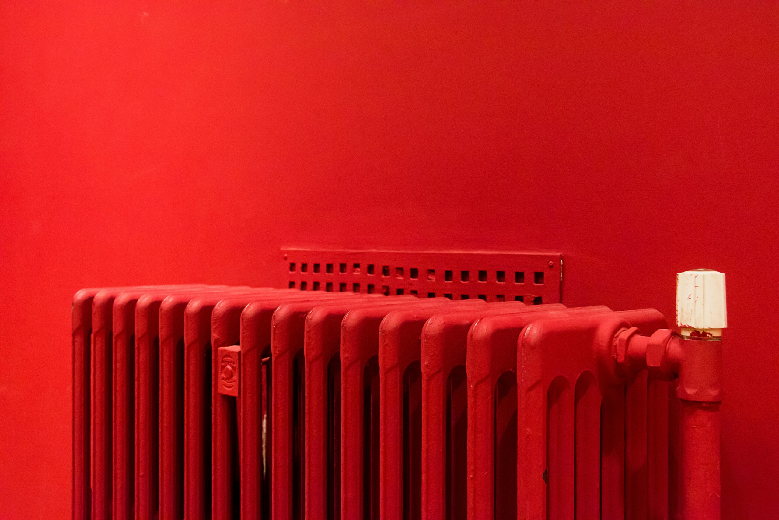 Modern Rointer electric radiator installed in an energy-efficient smart home